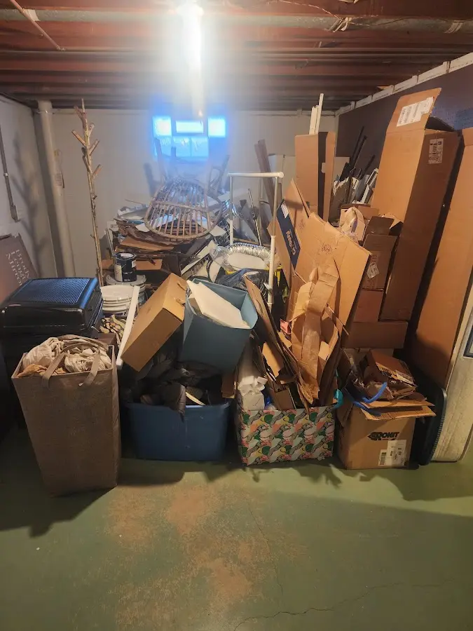 Roll-off dumpster container at job site for 4 Yard Dumpster Rental in Newport